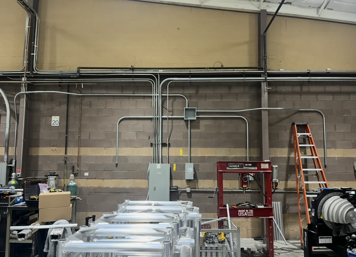 Commercial conduit installation on wall
